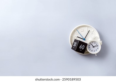 Black and white cube timer and other types of clocks on gray background. Concept of rush and slow life. Selective focus, copy space