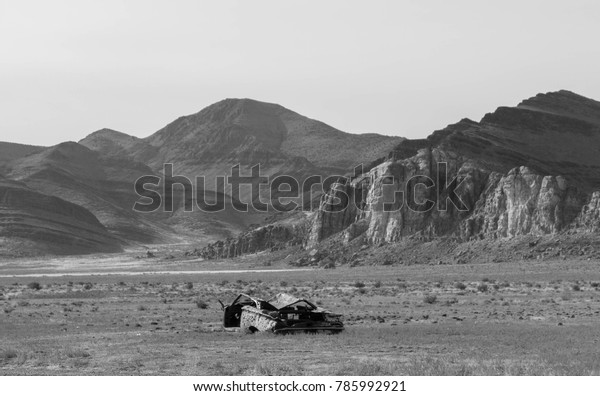 Black and White Desert\
Abandoned Car