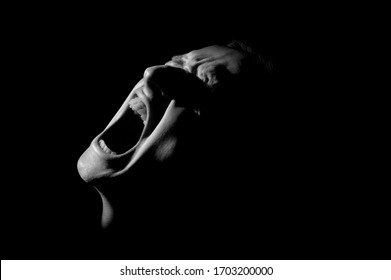 black and white dramatic portrait of a guy
