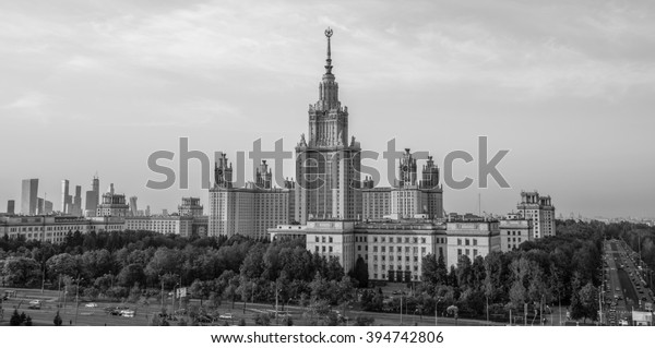 Black and white envelope size view of Moscow State\
University in summer