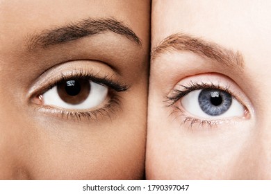 Black and white female putting faces together showing diversity