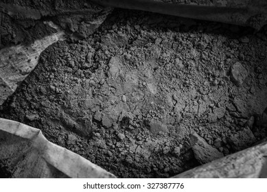 black and white filter photo effect of cement powder in bag before mix to concrete