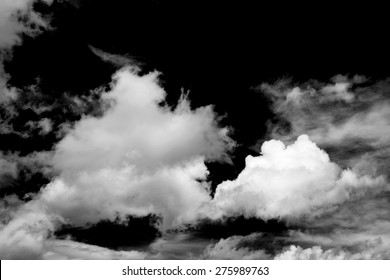 Black And White Fluffy Clouds In The Blue Sky