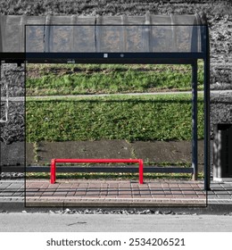 Black and white frame with colored interior of a red bench and metal and glass cover - Powered by Shutterstock