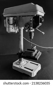 Black And White Generic Image Of An Old Electric Benchtop Drill Press