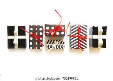 Black And White Gift Box. White Background. Black Friday. Red Ribbons.