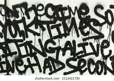 Black and white graffiti drawing from random words in a beautiful font on the wall as decoration or decoration - Shutterstock ID 2112421730
