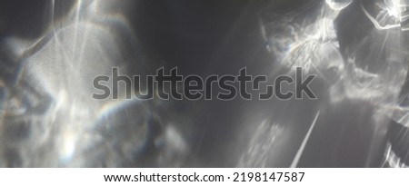 Black and white grain blur texture wall with refraction. Light and shadow smoke copy space abstract horizontal long background. 