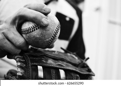 Black And White Graphic For Print Or Decor Of Baseball Player Holding Ball In Hand And Mitt To Pitch.  Good For Man Cave, Game Room Or Sports Theme Industry.