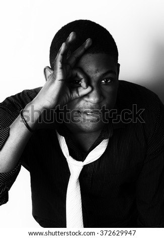 Similar – Image, Stock Photo African student with a bald head wearing a white shirt