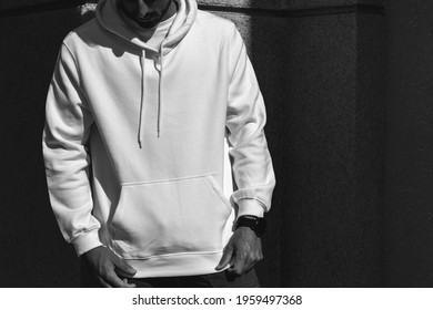 Black and white hoodie street style men's fashion portrait - Shutterstock ID 1959497368