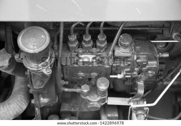 black\
white hydraulic pump engine machine pipe metal heavy cylinder\
industry steel fuel energy . background -\
image