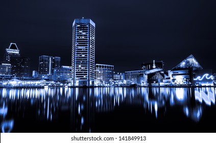 Black And White Image Of The Baltimore Inner Harbor Skyline At Night