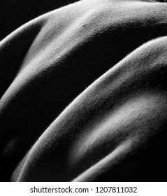 Black And White Image Of A Beautiful Female Body. There Is A Mystery! Studio Shooting Using Backlight. Sexy Body. Beautiful Body Parts. 