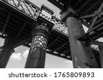 Black and white image of industrial viaduct structures from the industrial age in Castlefield in Manchester
