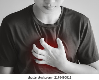 Black And White Image Of A Man Suffering From Chest Pain With Red Dots. Health Problems.