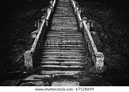 Black and white image of an old church staircase