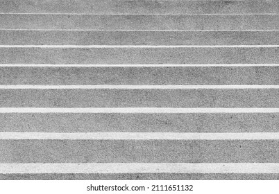 Black and white image of Pattern of outdoor stairs with light and shade from sunlight. Architectural design of stair concrete with shadow looking at a mirage Black and white. Copy space - Powered by Shutterstock