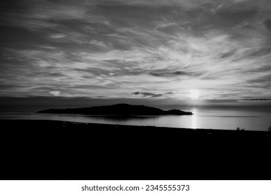 Black and white image of sunset over the Kapiti Island captured from Hemi Matenga walking trail viewpoint 