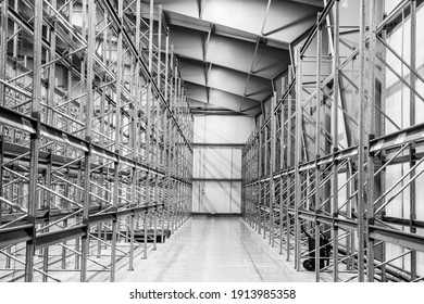 Black And White. Interior Of Modern Warehouse. Rack Stack. Metal Construction. Industrial Architecture. New Distribution Storehouse.