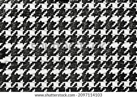 Black and white leather texture close-up, abstract houndstooth pattern