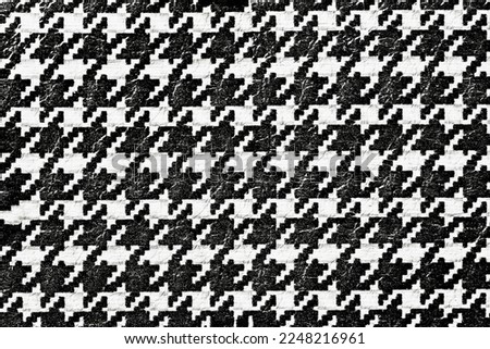 Black and white leather texture close-up, abstract houndstooth pattern