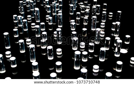 Black and White light art installation.Light passing through clear acrylic rods On a black background.Beautiful lighting art.