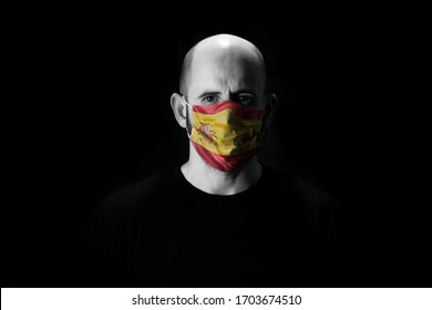 Black And White Man With Face Covered With A Mask And Spanish Flag

