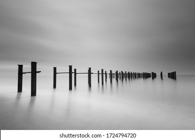 Black and white minimalist seascape, daytime long exposure, Antalya, Lara Beach, Turkey - Powered by Shutterstock