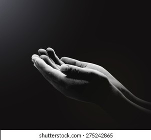 Black And White Muslim Open Two Empty Hands With Palms Up For Pray At Makkah