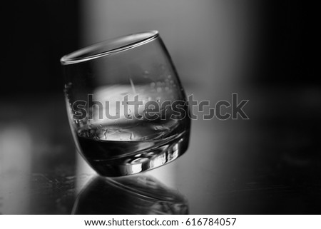 Similar – Image, Stock Photo a small glass of coffee and a white flower on a walnut table