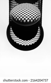 black and white oval with mesh pattern. symmetrical black and white pattern. white egg in patterned shadow