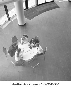 Black And White Photo Of Bussiness People On Meeting In Office