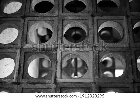 Black and white photo - circle pattern wall