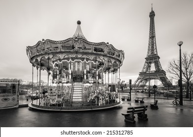 Black and white photo of Eiffel tower with a carousel, Paris, France
