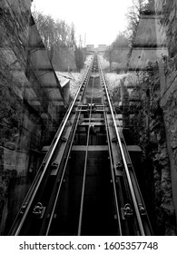 Black And White Photo Of Famous Ljubljana Funicular Heading To Castle. 