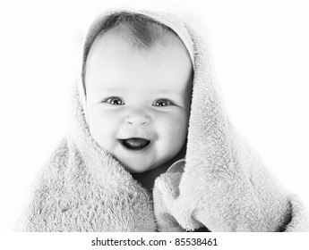 Black And White Photo Of  Happy Baby With Towel