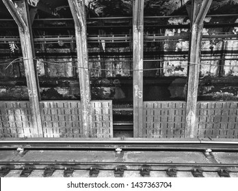 Black And White Photo Of Industrial Dirty NYC Subway Station