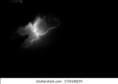 Black And White Photo Of A Lightning During A Storm On A Hot Summer Night