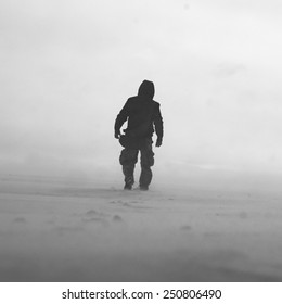 Black And White Photo Of Man In Snow Storm