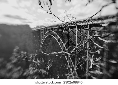black and white photo of the new river gorge bridge in west virginia
