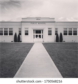 Black And White Photo Of Old Public School Building In Chinook, Washington Taken June 6th, 2020.