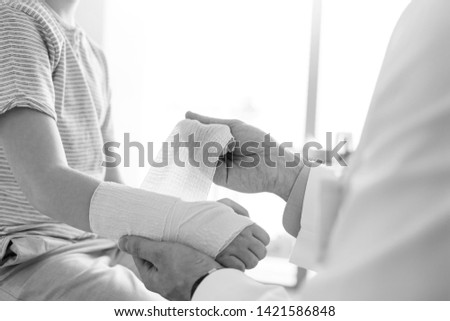 Similar – Female doctor filling out a questionnaire to senior patient