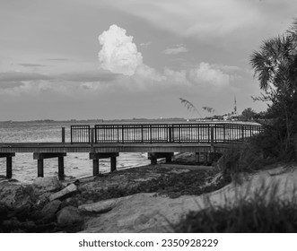 Black and white photo of the pier at Anna Maria Island in Florida. - Powered by Shutterstock