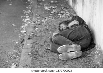 Young Homeless Boy Sleeping On Bridge Stock Photo 403125922 | Shutterstock