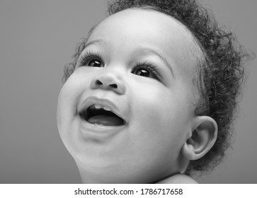 Black And White Photo Of Smiling Black Baby