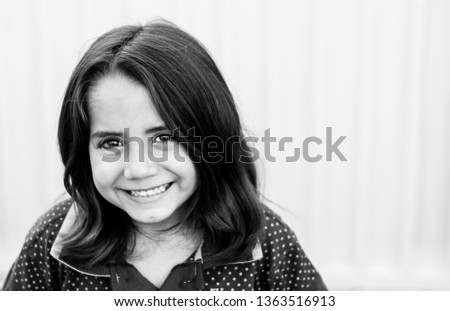 Similar – Happy adorable little girl smiling outdoors.