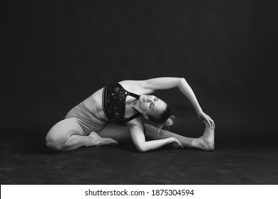 Black And White Photo Of Yoga Girl Performing Asana.