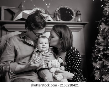 Black And White Photo Of Young Family Mom Dad Son In Winter Meadows In Studio With Winter Decor