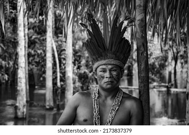 Black And White Photograph Of An Indian In His Community In The Amazon. City Of Manaus, State Of Amazonas, Brazil July 2, 2022.